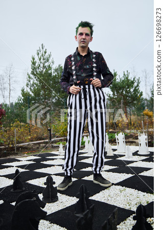 A Unique Fashion Statement Displayed on a Distinctive ChessboardInspired Landscape A Unique Fashion Statement Displayed on a Distinctive ChessboardInspired Landscape 126698273