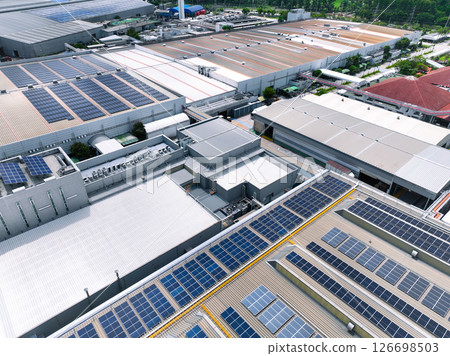 Solar-powered warehouse facility. Modern distribution center with rooftop solar panel. Eco-friendly warehouse. Sustainable logistics solutions for reduced carbon footprint. Sustainable energy. 126698503