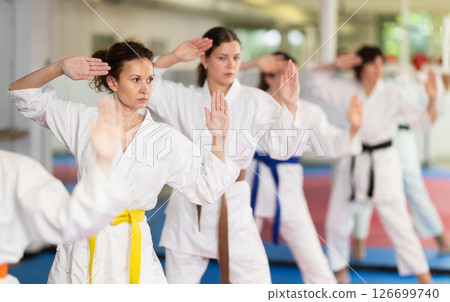 Women in a white kimono in training on a map 126699740