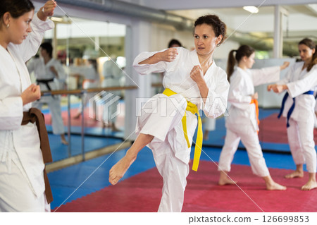 Women in kimonos do karate 126699853