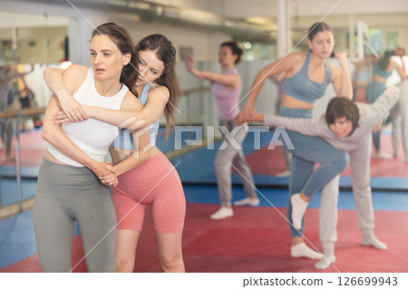 Women practicing gifts in self-defense training Women practicing gifts in self-defense training 126699943