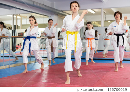 Female athletes standing in formation, kata starting position 126700019