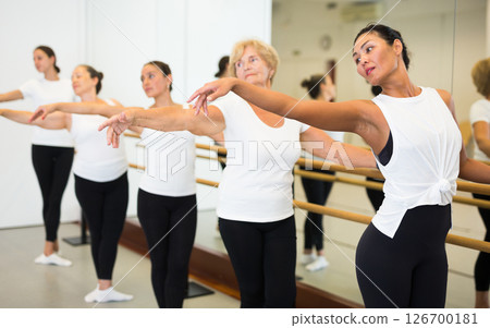 Various aged women dancing ballet 126700181