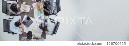 Banner Top view business people meeting together at office desk conference room. Team business meeting partnership planning brainstorming together. Team Collaborate group of partner with copy space 126700615