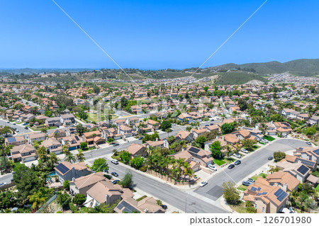 Aerial view of San Marcos neighborhood, with houses and street. South California 126701980