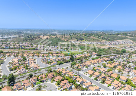 Aerial view of San Marcos neighborhood, with houses and street. South California Aerial view of San Marcos neighborhood, with houses and street. South California 126701981