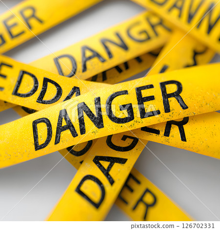 Yellow danger tape and warning messages 126702331