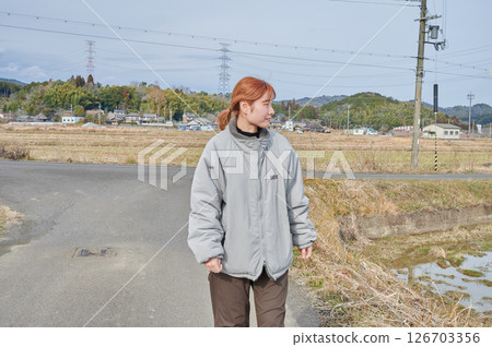 Woman gazing into the distance in nature 126703356