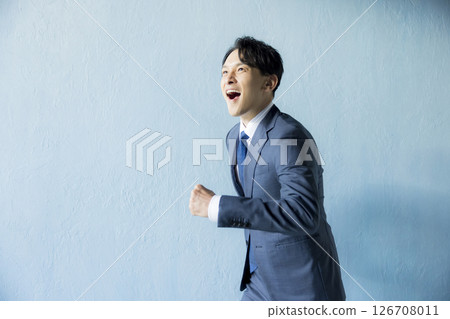 Running businessman 126708011
