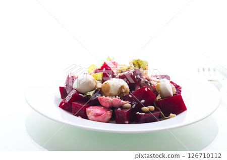 Delicious diet salad with mozzarella cheese and beetroot isolated on white background 126710112