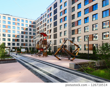 Modern Residential Playground with Safe Climbing Structures for Engagement and Fun 126710514