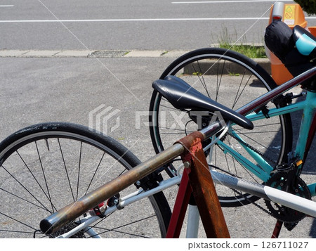 Road bikes on a bike rack 126711027