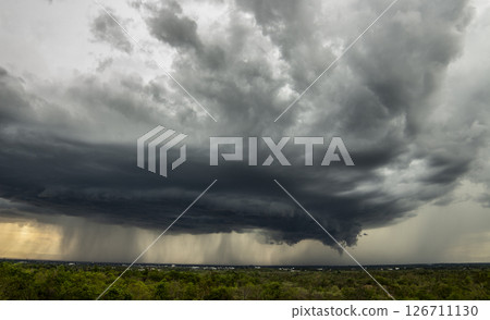 Storm clouds with the rain. Nature Environment Dark huge cloud sky black stormy cloud 126711130