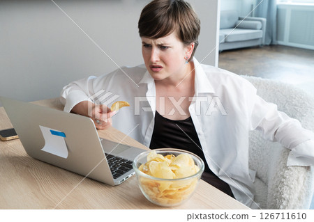 Young afroamerican man working with modern laptop Young afroamerican man working with modern laptop 126711610