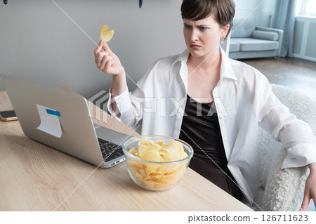 Young afroamerican man working with modern laptop Young afroamerican man working with modern laptop 126711623