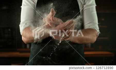 Freeze Motion Chef Clapping Hands with Flour . Closeup of Bread or Pizza Dough Preparation Freeze Motion Chef Clapping Hands with Flour . Closeup of Bread or Pizza Dough Preparation 126712890