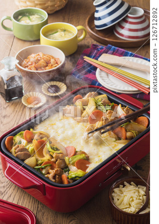 Cheese Dak-galbi on a hot plate 126712892