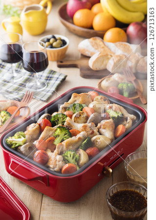 Roast chicken on a hot plate Roast chicken on a hot plate 126713163