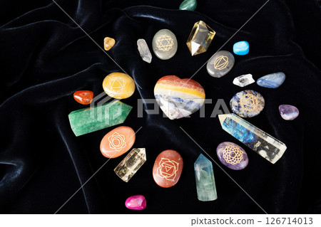 Healing crystals on brown background 126714013
