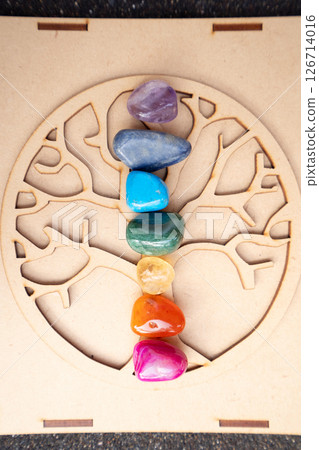 Healing crystals on brown background Healing crystals on brown background 126714016