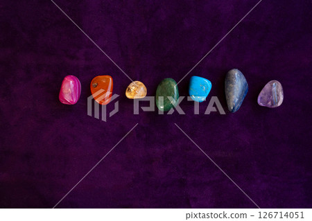 Healing crystals on violet background 126714051