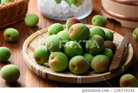 Harvested Kishu Nankou plums, green plums Harvested Kishu Nankou plums, green plums 126714142