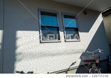 Sunlight hits the exterior of the house Sunlight hits the exterior of the house 126715136