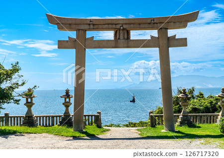 Iwatohime Shrine: Torii gate facing the sea and the Seto Inland Sea in early autumn 6, Ako City, Hyogo Prefecture 126717320