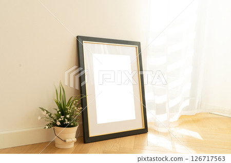 Seasonal Decor A Cozy Setting Featuring Charming Empty Frames Seasonal Decor A Cozy Setting Featuring Charming Empty Frames 126717563