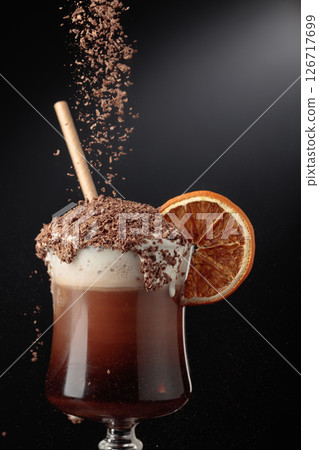 Chocolate cocktail with whipped cream sprinkled with chocolate chips. 126717699