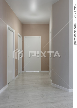 Modern minimalist hallway in contemporary apartment 126717952