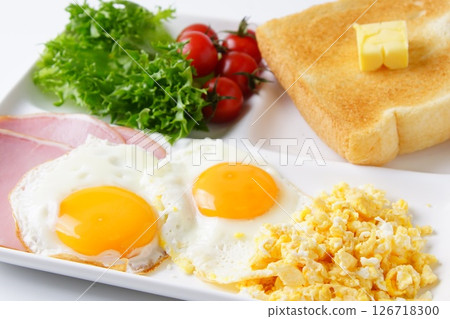 Toast and fried eggs breakfast Toast and fried eggs breakfast 126718300