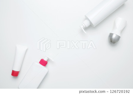 Cosmetic beauty products. Bottles and tubes with branding mock up. Skin care and beauty concept Cosmetic beauty products. Bottles and tubes with branding mock up. Skin care and beauty concept 126720192