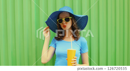 Summer vacation, beautiful modern young woman with cup of coffee, tourist girl drinking fresh juice 126720535