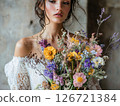 Wedding outfit decorated with blooming flowers and wild floral details highlighting botanical elegance 126721384