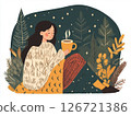 Woman in cozy blanket sipping hot chocolate during peaceful mindful evening at home 126721386