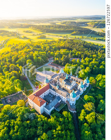 This stunning aerial view showcases the Baroque complex at Holy Mountain in Pribram, a renowned pilgrimage destination surrounded by lush greenery and natural beauty. 126722597