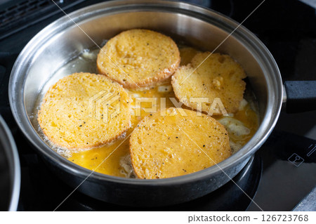 Enjoy the fantastic taste of homemade French toast cooked in a skillet for breakfast or brunch Enjoy the fantastic taste of homemade French toast cooked in a skillet for breakfast or brunch 126723768
