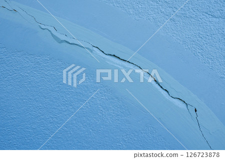 Blue wall texture background. Crack wall texture. Cracked concrete wall covered with cement surface. 126723878