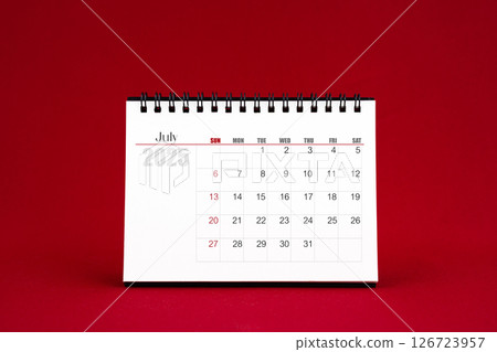 July 2025 Blank desk calendar on red background. July 2025 Blank desk calendar on red background. 126723957
