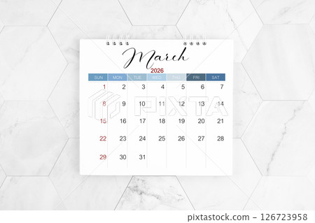 March 2026 blank desk calendar on marble table, Flat lay. March 2026 blank desk calendar on marble table, Flat lay. 126723958