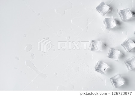 Melting ice cubes on a white background 126723977