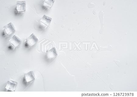 Melting ice cubes on a white background Melting ice cubes on a white background 126723978