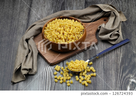 Italian Food background on wooden table. Top view. Italian Food background on wooden table. Top view. 126724393