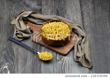 Italian Food background on wooden table. Top view. Italian Food background on wooden table. Top view. 126724394