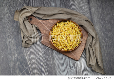 Italian Food background on wooden table. Top view. Italian Food background on wooden table. Top view. 126724396