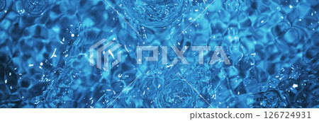 Blue water with ripples. Defocus blurred bleu clear calm water surface texture with splashes and bubbles. 126724931