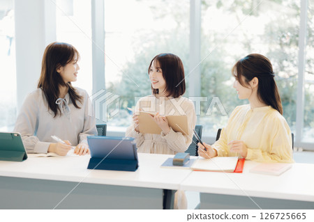 College students doing group work College students doing group work 126725665