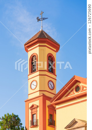Clock tower of Parroquia de San Jose Obrero in Malaga, Spain Clock tower of Parroquia de San Jose Obrero in Malaga, Spain 126725690