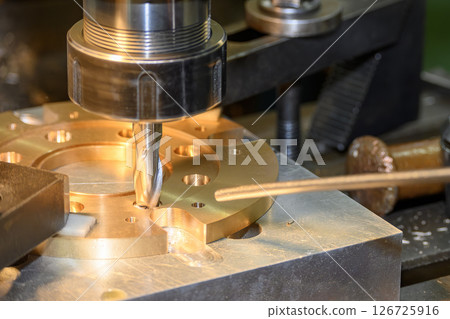 The hole counterbore process the brass material parts on NC milling machine by flat nose end mill tools. The hole counterbore process the brass material parts on NC milling machine by flat nose end mill tools. 126725916